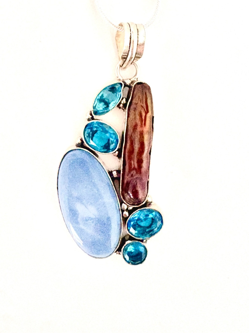 Gorgeous,925 marked, 2 1/2 inch, Owyhee Opal, Blue topaz and Biwa Pearl.pendant